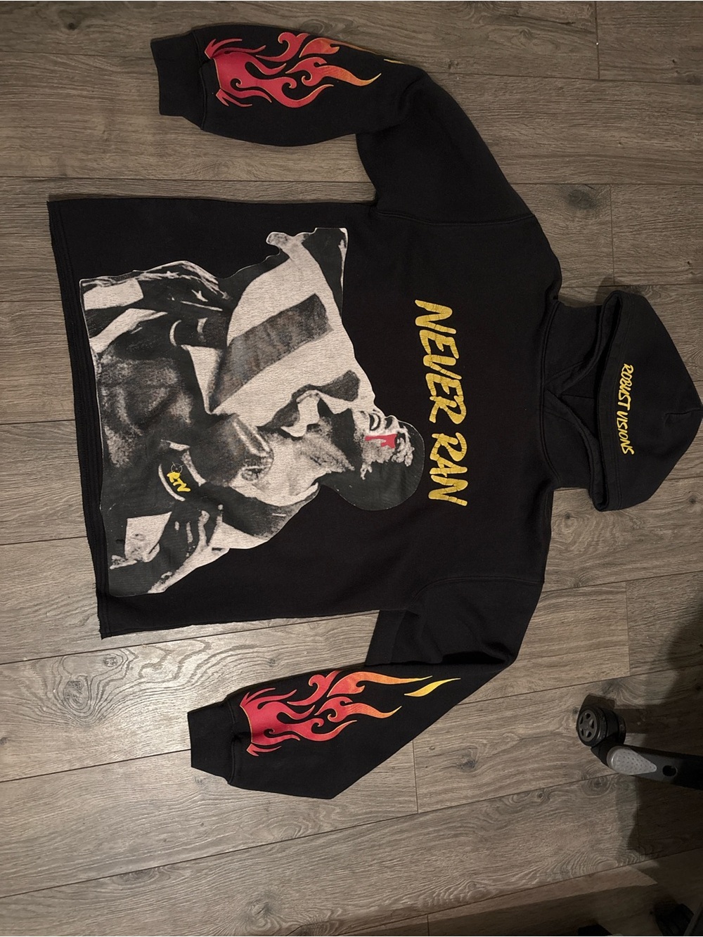 Black 'Never Ran' Graphic Hoodie with Flame Sleeves